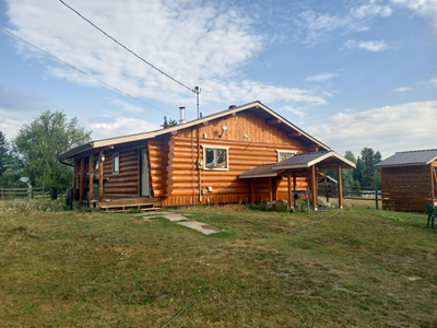 very nice log home . excellent water . wood and elec. heat, on working ranch near Bridge Lake south...