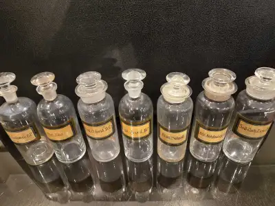 Matching set of 7 antique glass apothecary or drug store bottles with stoppers. $20 each (firm price...