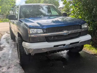 This 2003 Chevrolet Silverado 1500 HD is a heavy-duty powerhouse. Please note that this is a used ve...