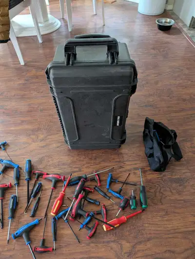 The toolbox/tools has never been used. Includes assorted screw drivers, T-handled Allen keys, small...