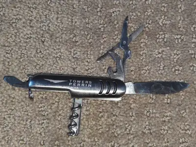I am selling a Multi-Tool Knife / Folding Pocket Knife - 7-in-1 in used, like-new condition. No issu...