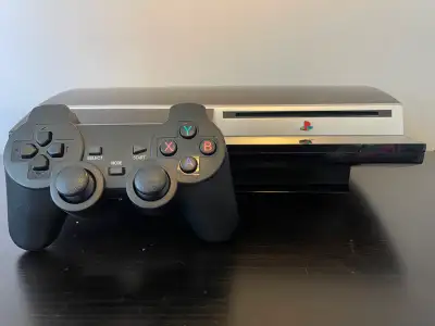 PlayStation 3 system fat and controller, View more