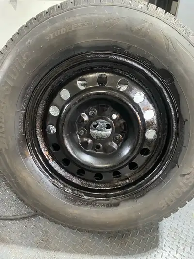 Bridgestone blizzacks Lt245/70R17 on steel rims off a Jeep grand Cherokee. Will fit Chrysler, Dodge...