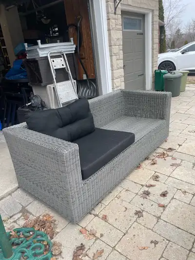 wicker sofa with 2 cushions only. , View more