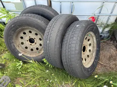 Priced for all four. 15-inch painted steel trailer rims. 5 on 4.5”. Worn out ST205/75D15 tires are c...