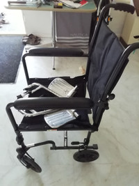 Lightweight wheelchair, foldable for easy transportation.