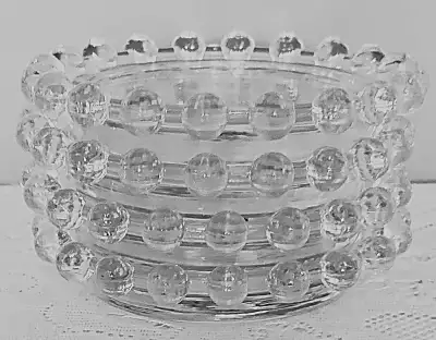 4 CLEAR GLASS COASTERS WITH 20 GLASS ORBS AROUND CIRCUMFERENCE, View more