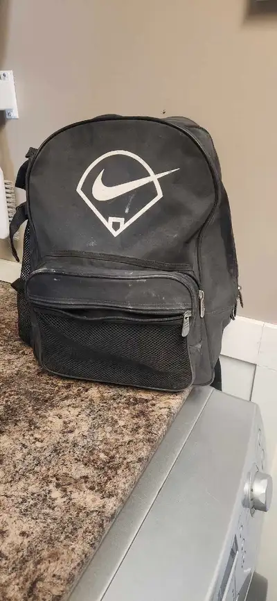 Kids baseball softball kit Includes Baseball bag Helmet Gloves Bat and balls All in great condition....