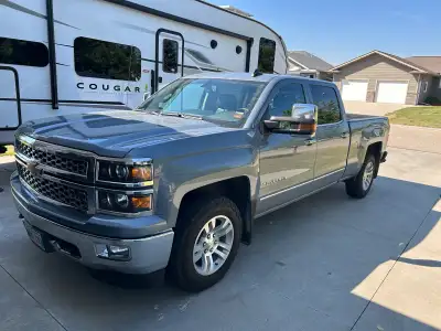 LTZ loaded with power rear window, hard to find max tow package. Leather, factory brake controller t...