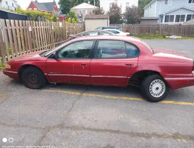 1994 Chrysler New Yorker, turns on fine with new battery, low mileage. Clean inside. Although a litt...