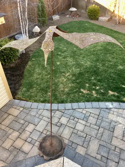 Offered for sale is an impressive metal flying goose structure, sitting atop a metal pole and base....