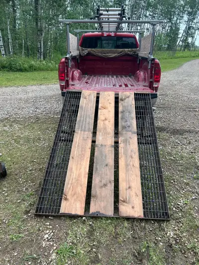34 inches tall 52 inches wide 75 inch ramp length Solid but not to bad to move around if needed Will...