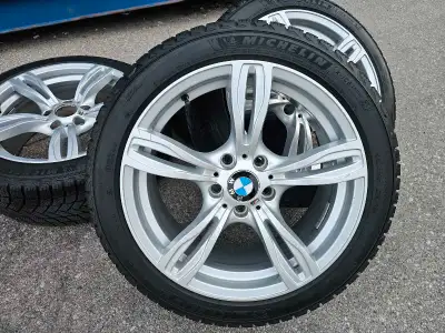 Set of 4 original 18" BMW M SPORT rims with Michellin brand new Michellin X-ICE winter tires on them...