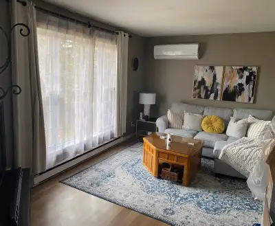 Three bedroom bungalow in quiet residential area (Sydney River area). Fridge, stove, laundry, heat p...