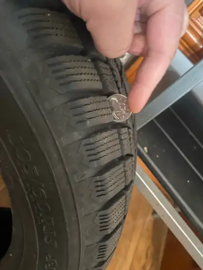 Four like new winter tires, 195/60R 15 200 obo.