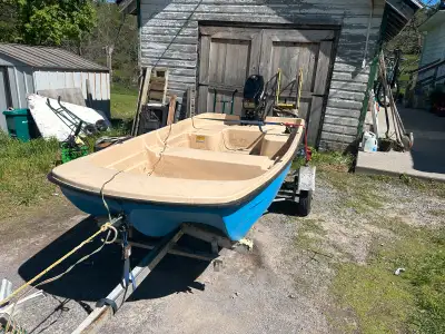 I have a boat and two working motors for sale or trade for a bigger motor for my other boat in the 1...