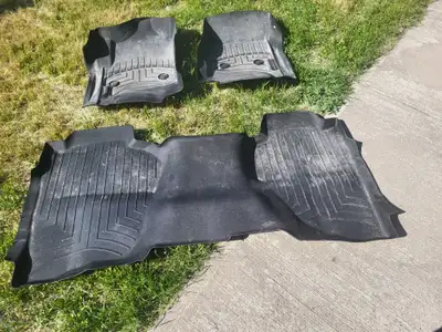 I am selling a set of Weather Tec Mates, drivers mat, pass. mat, and long back mat covers from 1 sid...