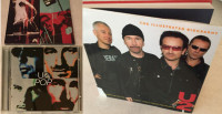 U2 lot - Illustrated Biography book + 2 rare VHS tapes + Pop CD