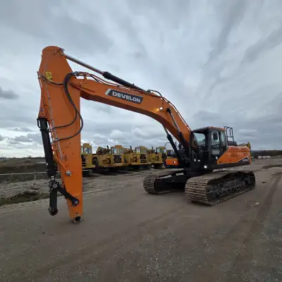 12'6" stick, 54" pin on bucket, 45 hours (Unused), 33" track pads, high pressure aux lines, quick co...
