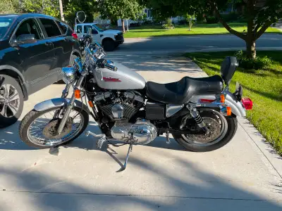 1999 Sportster 1200c with 53k km. Screaming Eagle pipes. New tires, battery and ignition. Original p...