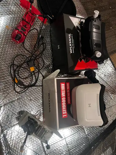 two goggles and two air units one with head tracking gimbal and 4K moonlight camera and with long ra...