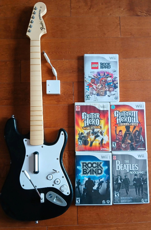 Bundle RockBand Wii Guitar + 5 jeux dans Nintendo Wii  à Laval/Rive Nord