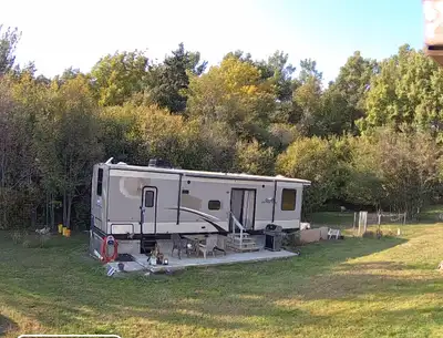Check out this 2013 two queen bedroom trailer, a cozy home on wheels perfect for your next adventure...