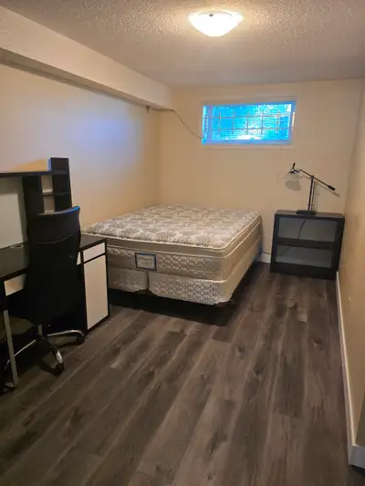 Furnished room with private on-suite bathroom available on the lower level of this bi-level house ne...