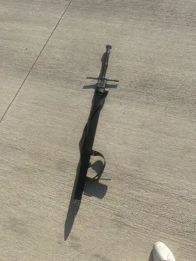 Witcher-style fantasy replica sword with matching scabbard. Great display piece for collectors, cosp...