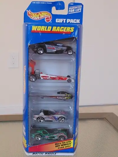 Hot Wheels World Racers Gift Pack of 5 Exclusive Cars New in package. Box shows little wear.