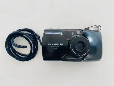 If you’re looking for a light, pocketable point-and-shoot analog camera with motorized film transpor...