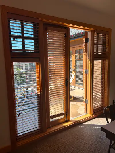 Sunlight streams into this beautiful, private office from skylights and beautiful French Doors openi...