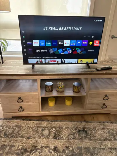 Tv sharp brand plus beautiful entertainment Center both for 325 .. or individual Tv for 160 and ente...