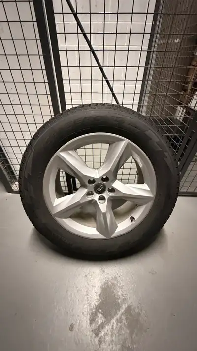 Full set of 4 premium winter tires mounted on original Audi 19” OEM rims with Audi center caps. Tire...