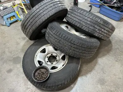 2018 Toyota Tacoma steel wheels and tires. Tires have 4/32 left. Comes with wheel nuts.