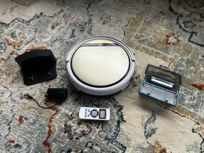 iLIFE V5s Pro robot vacuum Comes with charging dock, power adapter, remote control, and dust bin wit...