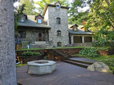 Unique Stone Canadiana beside Golf Course Oasis ,3 bedroom 2 1/2 bath 56,000 square foot lot , Doubl...