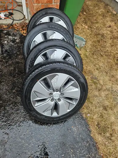 Tires are on Hyundai rims as they were on a Kona. Good tread left. Likely 2 summers left on them.