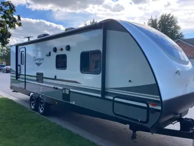 Solid construction with full, welded aluminum frame and roof trusses. Well appointed corner kichen,...