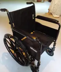 Wheelchair with Swing Away Footrests & Folding Back