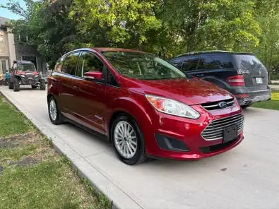 2015 Ford C-MAX SE Hybrid Hatchback, 4Cyl, Fully Loaded but most importantly this car gets 42 MPG in...