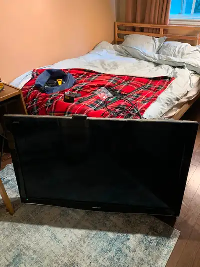 40 inch Sharp Flat Screen TV & Swivel Wall Mount, View more