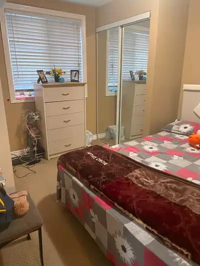 Sharing Room available for 1 girl in a 2-bedroom basement