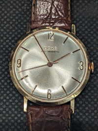 Doxa 14k gold watch 