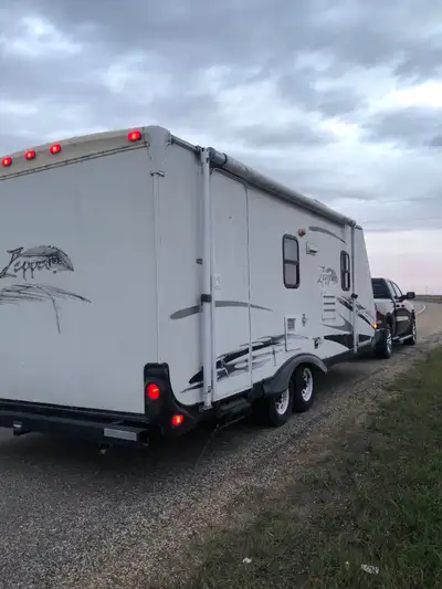 2004 Keystone Zeppelin 241 travel trailer, 24’, with one slide out, has a roof leak in front, so a c...