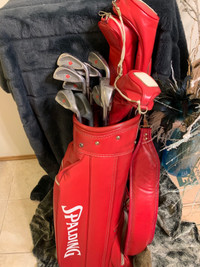 Vintage red Spalding bag and set of mixed clubs