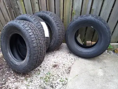 SET OF 4 BRAND NEW COOPER LIGHT DUTY TRUCK TIRES 265-7016, ASKING $900.00 OBO