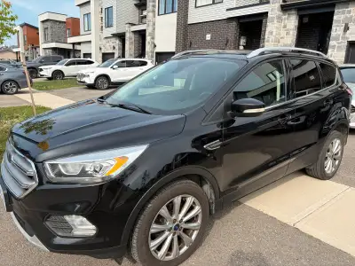 Meticulously maintained Escape Titanium 4WD, loaded up with all available options for 2017! Includin...