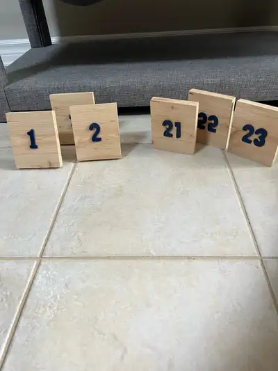 Elevate your event with these handcrafted wooden table number blocks, perfect for weddings, parties,...