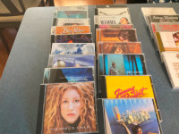 Variety of music cd’s plus a vintage but still working cd player